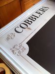 Cobblers menu board by Impact signs Ossett